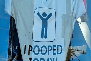 Photo of a T-shirt proclaiming I pooped today.