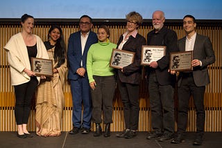 Winners of Izzy Award 2019. L to R: Zoe Loftus-Farren, Maureen Nandini Mitra, (Raza Rumi Dir. PCIM), Monica Mohapatra, Laura