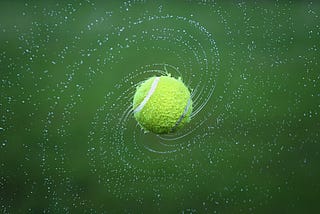 A spinning tennis ball