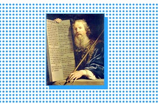 Moses holding a scripture with the Ten Commandments