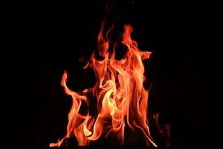 A fire against a black background