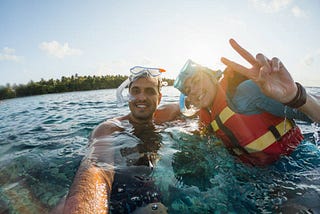 2 people snorkeling on the sea surface, snorkeling in andaman