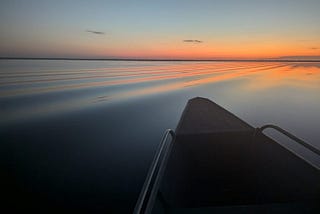 Sunrise over the Rio Negro near Tumbira, Brazil in the Amazon river basin (photo by Dave Thau)
