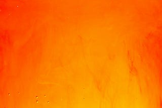 Firey red and yellow image like paint merging together