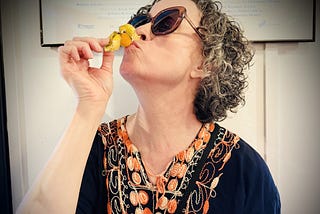 author kissing a gooseberry in Spain