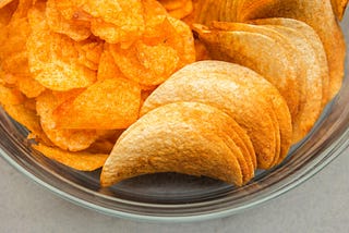 Crisps all alike on a tray ready to be eaten