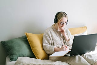 Person on laptop in bed