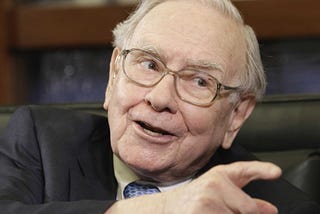 Warren Buffett laughs as your bracket dies
