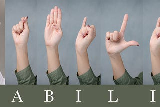 The word “Disability” letter spelled in ASL with the DIS separated from ABILITY