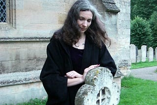 Author at a grave in England, tuning in as a medium