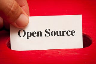 What is an open source project and how can a beginner contribute to it?