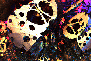 An abstract, partly dark, partly colorful artwork showing irregular shapes and what may be blots of paint.