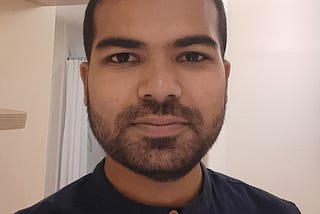 This is the latest version of me in a brightly lit room smiling at you. — alt text to boost Medium stories.