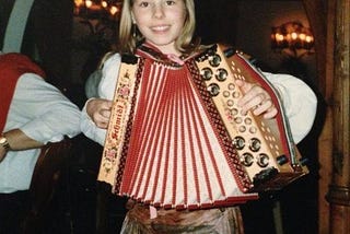 At nine years old, me with my Styrian accordion. © Author