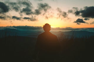 Man staring at the sunset