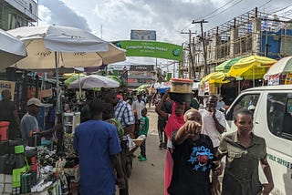 Scott Beyer and I touring the largest informal ICT accessories market in Africa — Computer Village. It is located in Ikeja, the capital of Lagos.
