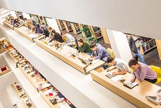 students studying inside the edward boyle library at leeds