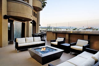 propane firepit gathering spot in an apartment terrace