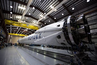 SpaceX rocket inside a hangar.