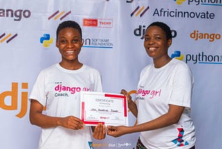 Angelica Bassey receiving the certificate of mentoring from Mrs Glory Justin @djangogirlsfreeworkshop2023