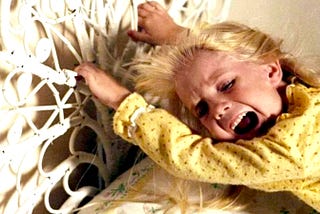 Screenshot of the late Heather O’Rourke as the terrified Carrie Ann in ‘Poltergeist.’