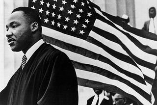 In The Wake of the King of Love: Dr. Martin Luther King, Jr. & Our Nation Today