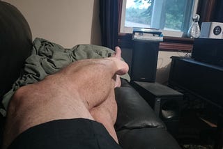 Picture of writer’s tanned and taut muscular legs