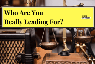 Antique scales on desk with yellow banner with text “Who are you really leading for?”