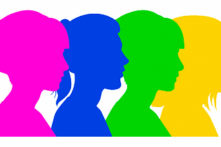 A silhouette of four women facing the future