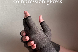 Author’s photo of hands with compression gloves due to rheumatoid arthritis
