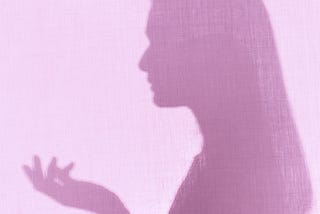 shadow silhouette of a woman in profile
