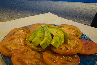 Tomato and avocado with a view.