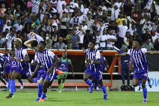 Violette AC celebrate after beating Austin 3–0