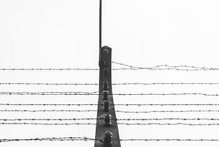 Electrified barb wire fence from a concentration camp in WWII Germany