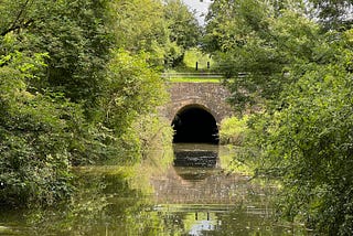 Photo by Author of a canal and a tunnel