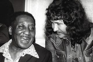 Former Black Sabbath manager and co-author of the Dirty Stop Out’s Guide to 1970s Birmingham Jim Simpson with Muddy Waters