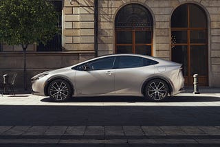 2023 Toyota Prius Limited parked on a city street.