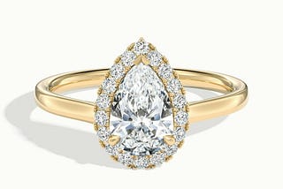 PEAR SHAPED ENGAGEMENT RINGS WITH WEDDING BANDS