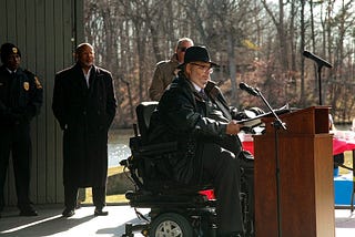 Tim Adams, Mayor of Bowie, spoke from a podium on March 13 to the crowd in Bowie, Maryland. Photo by Delonte Harrod.