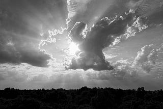 The sun breaking through a cloud