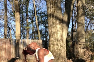 Black woman doing yoga