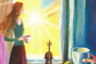 A woman standing at a sunny window holding a mug of coffe with a violin resting against the wall.