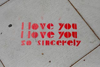 Writing on the floor: “I love you, I love you so sincerely.”