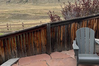 Yoga mat and blanket looking out at the mountains