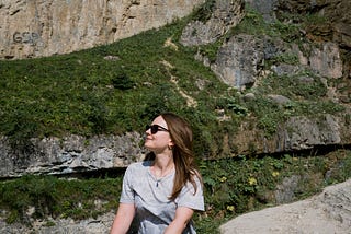 woman sitting in nature