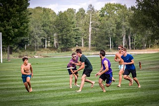 Unbound students playing Ultimate at APEX