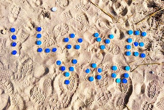 Words written and left / blue candles waiting in sand / to burn for lovers.