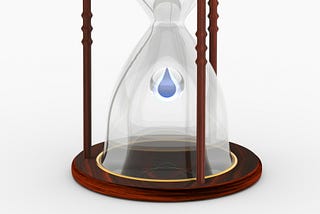 A drop falls in an hourglass. Photo illustration by Buddha Elemental 3D on Unsplash