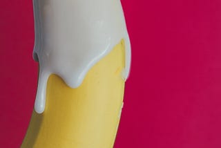 banana with cream, pink background