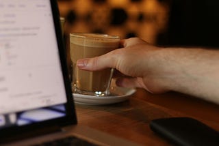 Software Developer Reaching For Coffee